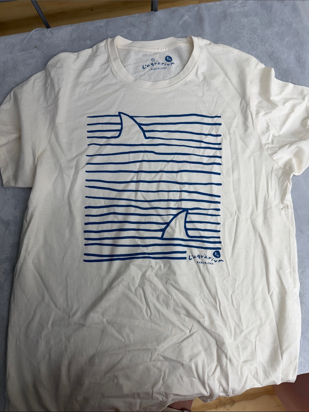 Lequarium Barcelona White Graphic Tee with Blue Shark Fin Stripes